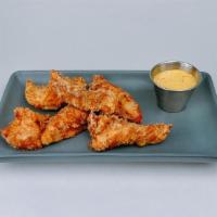 Chicken Tenders · Hand-breaded, your choice of honey mustard or buffalo style with bleu cheese dressing