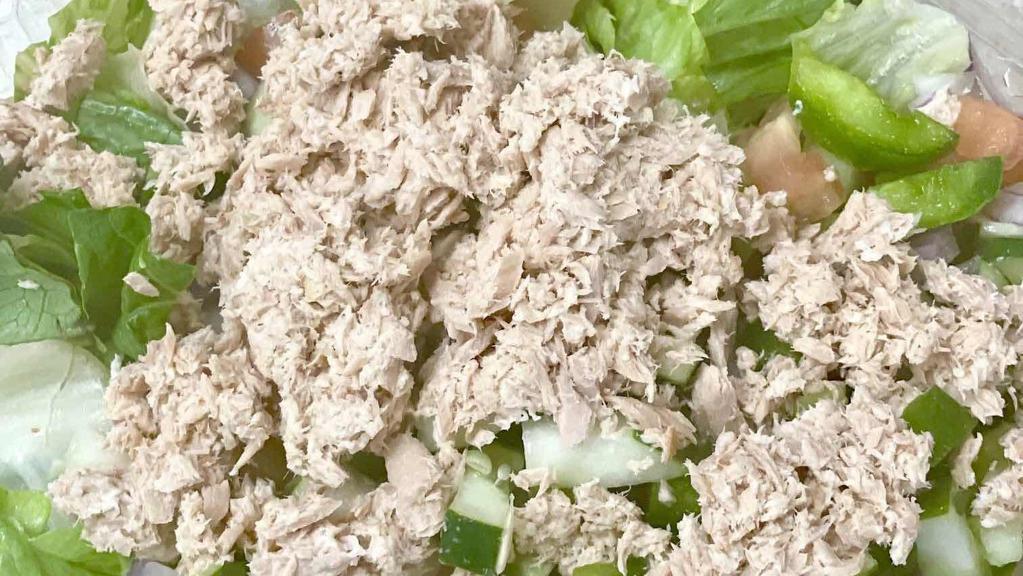 Dons Tuna Salad · Dons tuna salad is served with cucumbers, peppers, red onions, tomatoes, tuna.