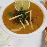 Haleem · Mix Lentils cooked with Chicken and house special Spices.