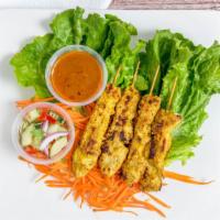 Chicken Satay (4) · Thai Style Grilled chicken breast served with Peanut sauce, Cucumber salad