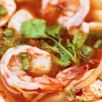 Tom Yum Soup · Medium Spicy. Chicken, Shrimp or Vegetable, spicy lemongrass shrimp broth with fresh mushroo...