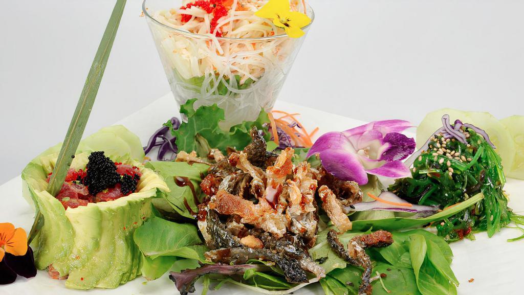 Mira Chef'S Salad · salmon skin, kani, seaweed & spicy tuna with mixed greens, avocado, caviar & sweet ginger dressing.