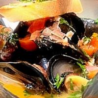 Maine Mussels · White Wine Sauce, Garlic, Herbs, Tomato, Baguette