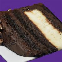 Chocolate Cheesecake Explosion · A layer of cheesecake between layers of moist devils food chocolate cake alternated with lay...