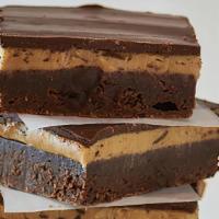Buckeye Brownie · A peanut butter and chocolate lover’s dream, these gluten-free buckeye brownies are made wit...