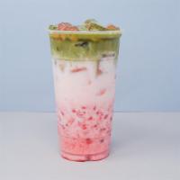 Strawberry Matcha Latte With Cherry Blossom · Matcha green tea layered above strawberry latte, with cherry blossom boba included