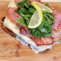 3 Cheese Italian · Prosciutto, melted swiss and fontina with roasted garlic onion jam, topped with dressed arug...