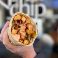 Malik Al-Batata · Pita, Chicken Shawarma, Fries, Pickles, Onions, Special Sauce. Extra dipping sauce included....