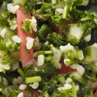 Tabbouleh · 8oz's of house-made blend of parsley, red onion, tomato, bulgur, lemon juice and spices