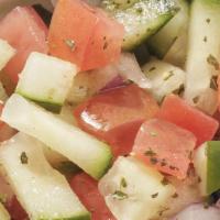 Tomato & Cucumber Salad · 8 oz's of house-made blend of tomato, cucumber, red onion, dried mint and lemon juice