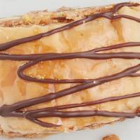 Nutella Baklava · A rich, sweet pastry made of layers of filo dough. Filled with chopped cashews, Nutella, and...