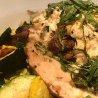 Bavarian Hefeweizen Chicken · Pan seared chicken breast, layered with herbed goat cheese, roasted mushrooms and Hefeweizen...