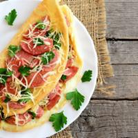 Ham & Cheese Omelette · Fresh ham slices with cheese wrapped in omelette and served with beans, potatoes, and two to...