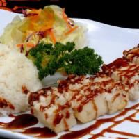 Tofu Dinner · Soft tofu cooked with teriyaki sauce and a hint of Japanese herb.