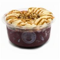 Power · Pure acai with chocolate protein topped with granola, banana, peanut butter.