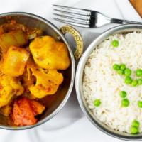 Aloo Gobi · Cauliflower and potatoes cooked with onions, tomatoes and Indian spices.