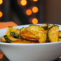 Cold Spicy Crispy Cucumbers · Fresh, crunchy cucumber slices, chilled and spiced. Spice level 2 out of 5.