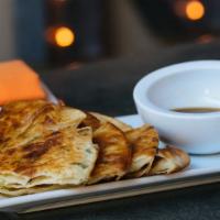 Scallion Pancakes · flaky pancake layered with scallions - vegetarian - spice: 0/5