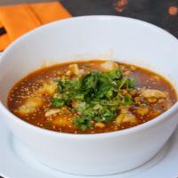 Spicy Mixed Tofu Pot · Your choice of protein mixed with tofu in spicy Sichuan pepper hot sauce with pickled vegeta...