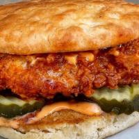 Hot Chicken Sandwich (Biscuit) · Spicy Buttermilk Fried Chicken Sandwich with pickles and Thunder Sauce on a Hot Flakey Butte...