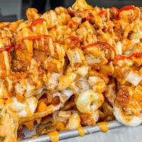 Hot Mess Fries · Seasoned Waffle Fries topped with Spicy Buttermilk Fried Chicken Bites, White Cheddar Mac & ...