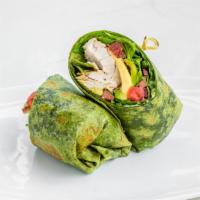 Chicken Avocado Wrap · Grilled chicken, fresh avocado, baby spinach, swiss cheese, and tomato with garlic aioli in ...