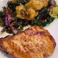 Sea Bass* · Gluten free. Chilean sea bass pan-seared and served over sautéed Swiss chard and risotto wit...
