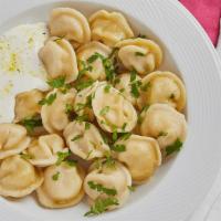 Pelmeni · Small russian style dumplings with meat.