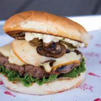 Mushroom Cheeseburger · A delicious burger filled with minced beef patty, topped with melted cheese and piled onto s...