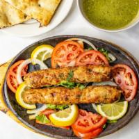 Seekh Kabab · Chicken or lamb comes with naan or rice and salad.