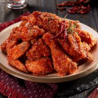 Red Hot Pepper Chicken · Spicy.  Crispy and tender chicken tossed in our addictive gochujang sauce