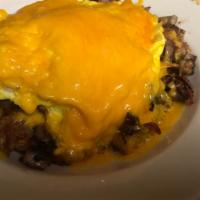 Breakfast Bowl · A mixture of home fries, bacon, sausage, ham, scrambled eggs covered with cheddar cheese wit...