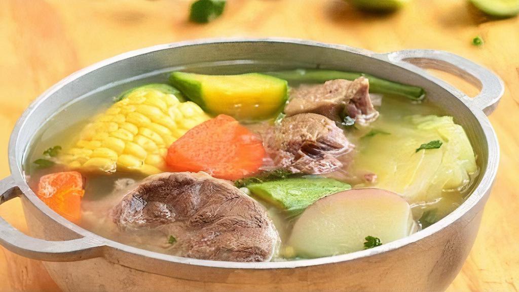 Sopa De Res · Delicious short beef ribs, with chayote, carrot, zucchini, yuca roots and more