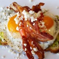 Avocado Toast · Two slices of ancient grain toast, two eggs your way, fresh avocado, local bacon, local hydr...