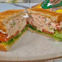 Mediterranean Tuna · Our Signature Tuna Salad on White Toast, Topped with Pickles, Tomato, and Lettuce
