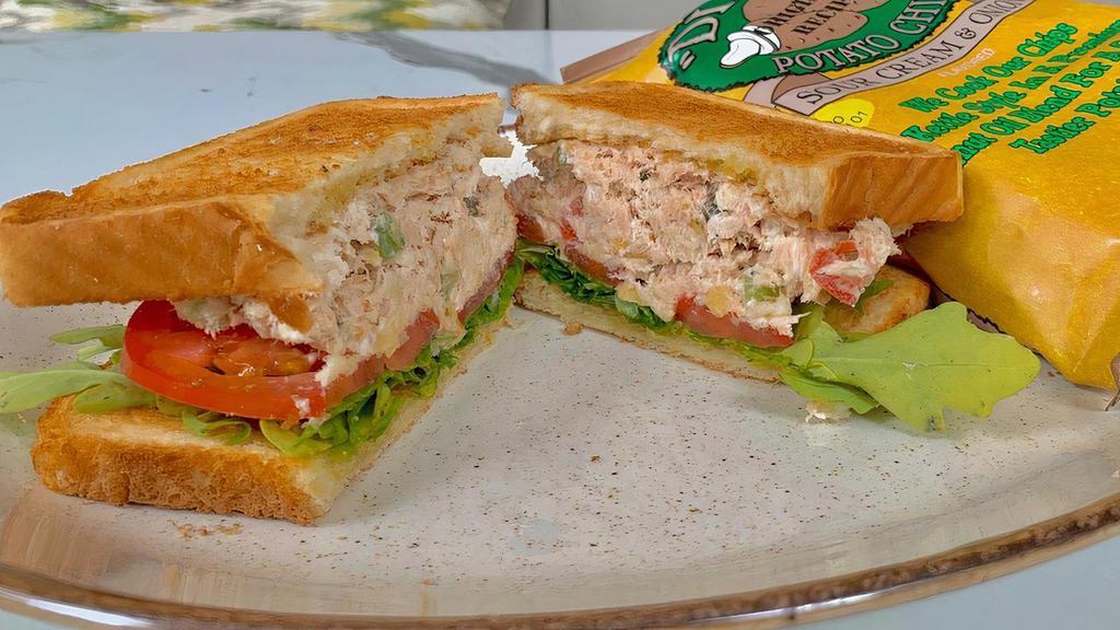 Mediterranean Tuna · Our Signature Tuna Salad on White Toast, Topped with Pickles, Tomato, and Lettuce