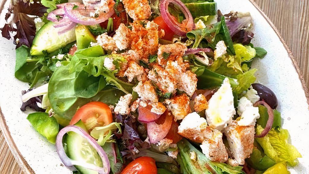 Greek Salad · Fresh Mixed Lettuce, Cherry Tomatoes, Cucumbers, Green Peppers, Red Onions, Feta, Pepperoncini, Olives, and Red Wine Vinaigrette
