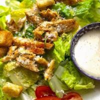 Caesar Salad · Romaine Lettuce, Grilled Chicken, Parmesan Flakes, Croutons, with Creamy Caesar
