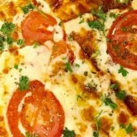 Tomato And Cheese Flatbread · Classic Red Sauce, Cheese, Fresh Tomato, Oregano