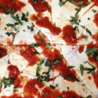 Margherita Pizza · Plum tomato, fresh mozzarella and fresh basil.