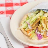Chicken Gyro · Lettuce, tomatoes, onions, Feta cheese, and gyro sauce.