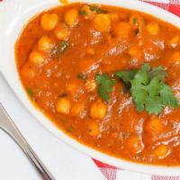 Chana Masala · Chick peas, onions, tomatoes in a spicy sauce.