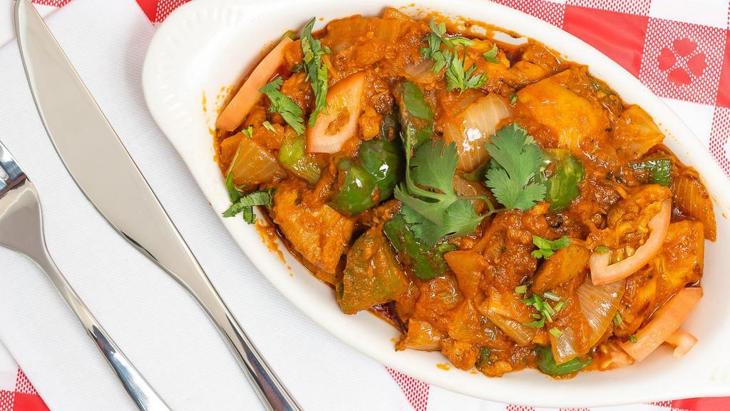 Chicken Jaifrezi · Boneless chicken pieces cooked with curry, tomatoes, green peppers and onions.