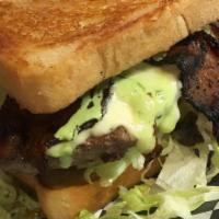 Phatty Melt · Burger with pepper bacon, diced onions, roasted poblano, jack cheese & green chile ranch.