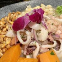 Ceviche Mixto · Seafood ceviche with an assortment of seafood marinated in freshly squeezed lime juice, seas...