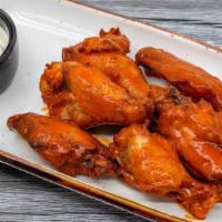 Chicken Wings · Seven pieces wings with buffalo or lemongrass, sriracha honey emulsion.