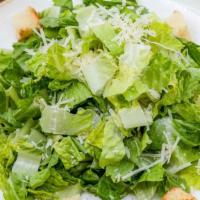 Caesar Salad · Crouton, parm cheese and toasted garlic, Caesar dressing.