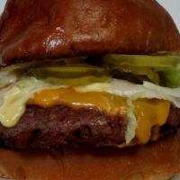 Vegas Beyond Burger · Beyond Burger, Vegas Sauce, Lettuce, American Cheese, Pickles, Onions, Toasted Sour Duck Bun