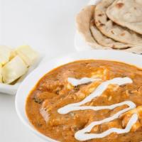 Paneer Butter Masala · Cottage cheese cubes cooked in a rich & creamy mildly spiced masala base