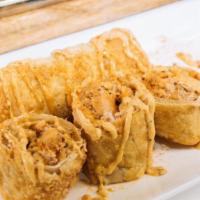 Crab Cake · 1 Real Lump Crab meat and  Shrimp egg roll made in our secret garlic butter crab sauce. crab...
